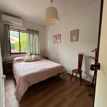 En Con Jardín Casa de Férias *